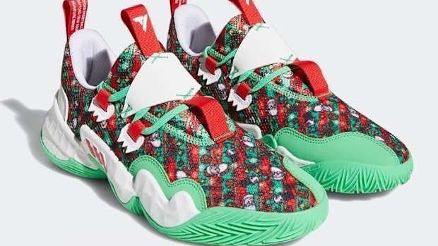 View of red and green adidas shoes.